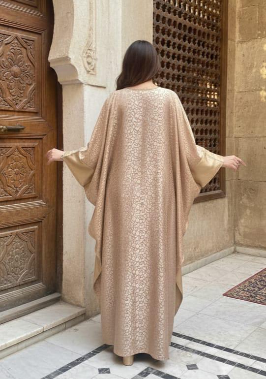 A closed butterfly abaya