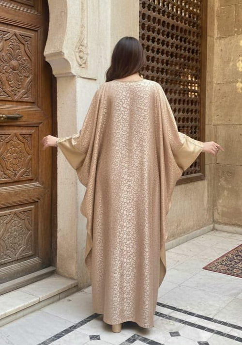 A closed butterfly abaya