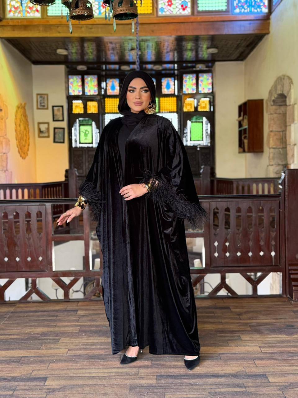 Velvet kaftan with feathers